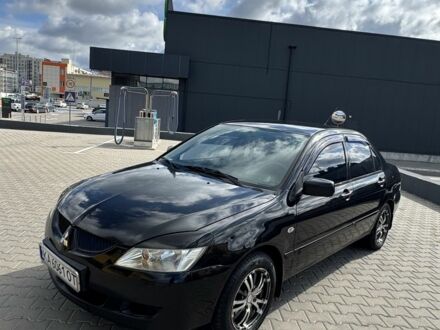 Чорний Міцубісі Lancer, об'ємом двигуна 1.6 л та пробігом 310 тис. км за 3500 $, фото 1 на Automoto.ua