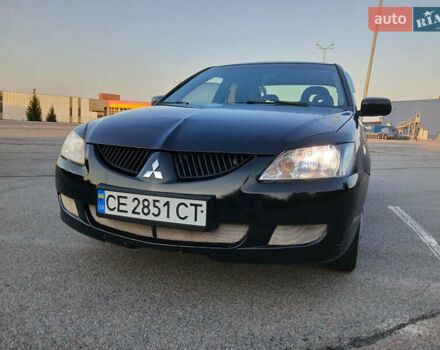 Чорний Міцубісі Lancer, об'ємом двигуна 1.6 л та пробігом 296 тис. км за 3200 $, фото 1 на Automoto.ua