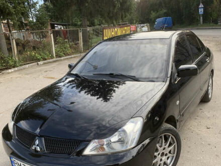 Міцубісі Lancer 2005 у Сумах на Automoto.ua Чорний Міцубісі Lancer, об'ємом двигуна 1.58 л та пробігом 219 тис. км за 5100 $, фото 1 на Automoto.ua