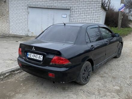 Чорний Міцубісі Lancer, об'ємом двигуна 1.6 л та пробігом 250 тис. км за 3500 $, фото 1 на Automoto.ua