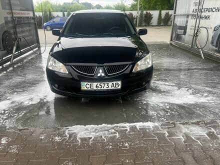 Міцубісі Lancer 2005 у Чернівцях на Automoto.ua Чорний Міцубісі Lancer, об'ємом двигуна 1.6 л та пробігом 1 тис. км за 3900 $, фото 1 на Automoto.ua