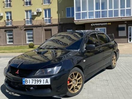 Чорний Міцубісі Lancer, об'ємом двигуна 2 л та пробігом 270 тис. км за 5500 $, фото 1 на Automoto.ua