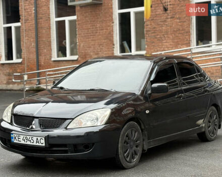 Черный Мицубиси Лансер, объемом двигателя 1.58 л и пробегом 198 тыс. км за 3700 $, фото 1 на Automoto.ua