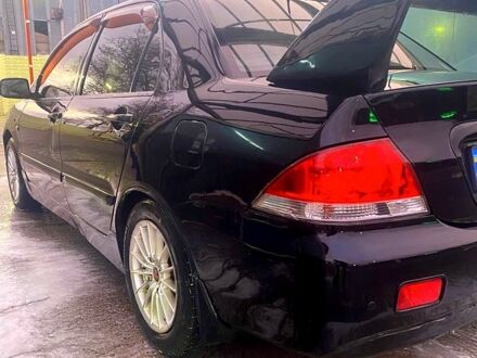 Міцубісі Lancer 2005 у Одесі на Automoto.ua Чорний Міцубісі Lancer, об'ємом двигуна 1.6 л та пробігом 200 тис. км за 4000 $, фото 1 на Automoto.ua
