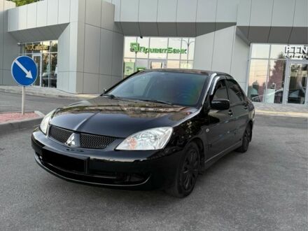 Міцубісі Lancer 2005 у Дніпро (Дніпропетровську) на Automoto.ua Чорний Міцубісі Lancer, об'ємом двигуна 1.6 л та пробігом 192 тис. км за 4499 $, фото 1 на Automoto.ua