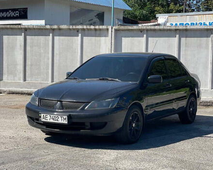 Чорний Міцубісі Lancer, об'ємом двигуна 1.58 л та пробігом 320 тис. км за 3600 $, фото 1 на Automoto.ua