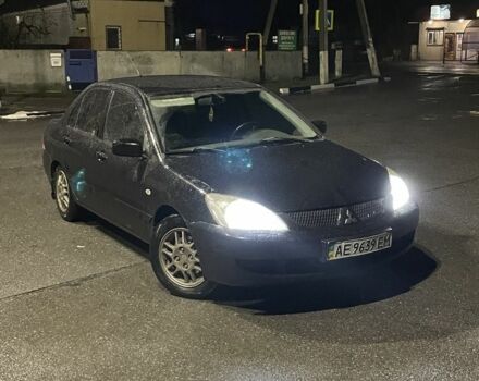 Чорний Міцубісі Lancer, об'ємом двигуна 1.6 л та пробігом 200 тис. км за 3499 $, фото 1 на Automoto.ua