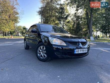 Чорний Міцубісі Lancer, об'ємом двигуна 1.6 л та пробігом 261 тис. км за 4100 $, фото 1 на Automoto.ua