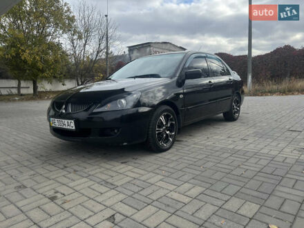 Чорний Міцубісі Lancer, об'ємом двигуна 1.58 л та пробігом 364 тис. км за 4000 $, фото 1 на Automoto.ua