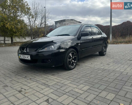 Чорний Міцубісі Lancer, об'ємом двигуна 1.58 л та пробігом 364 тис. км за 4000 $, фото 1 на Automoto.ua