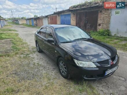 Міцубісі Lancer 2005 у Александрие на Automoto.ua Чорний Міцубісі Lancer, об'ємом двигуна 1.58 л та пробігом 284 тис. км за 4699 $, фото 1 на Automoto.ua