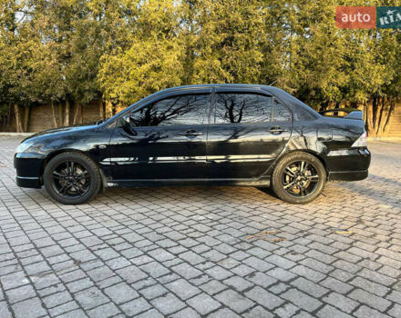 Чорний Міцубісі Lancer, об'ємом двигуна 2 л та пробігом 360 тис. км за 4000 $, фото 1 на Automoto.ua