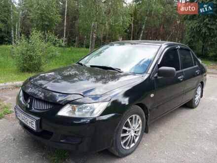 Мицубиси Лансер 2005 в Кропивницком (Кировограде) на Automoto.ua Черный Мицубиси Лансер, объемом двигателя 1.58 л и пробегом 306 тыс. км за 3800 $, фото 1 на Automoto.ua