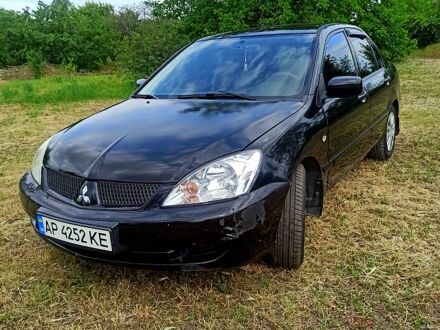 Міцубісі Lancer 2005 у Запоріжжя на Automoto.ua Чорний Міцубісі Lancer, об'ємом двигуна 1.6 л та пробігом 206 тис. км за 3400 $, фото 1 на Automoto.ua