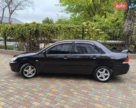 Міцубісі Lancer 2005 у Одесі на Automoto.ua Чорний Міцубісі Lancer, об'ємом двигуна 1.58 л та пробігом 206 тис. км за 3900 $, фото 1 на Automoto.ua