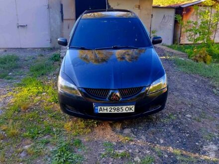 Міцубісі Lancer 2005 у Краматорске на Automoto.ua Чорний Міцубісі Lancer, об'ємом двигуна 1.6 л та пробігом 250 тис. км за 3500 $, фото 1 на Automoto.ua