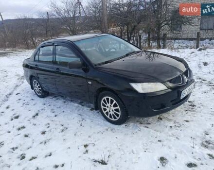 Чорний Міцубісі Lancer, об'ємом двигуна 1.6 л та пробігом 275 тис. км за 2999 $, фото 1 на Automoto.ua