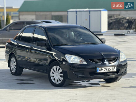Чорний Міцубісі Lancer, об'ємом двигуна 1.6 л та пробігом 205 тис. км за 3650 $, фото 1 на Automoto.ua