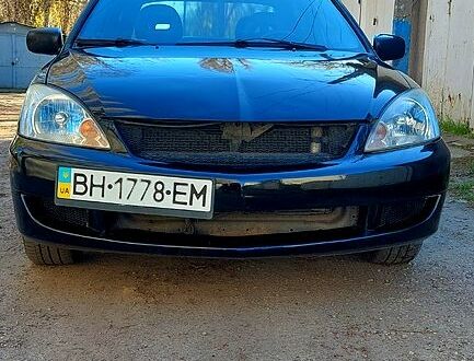 Міцубісі Lancer 2005 у Одесі на Automoto.ua Чорний Міцубісі Lancer, об'ємом двигуна 16 л та пробігом 412 тис. км за 3200 $, фото 1 на Automoto.ua