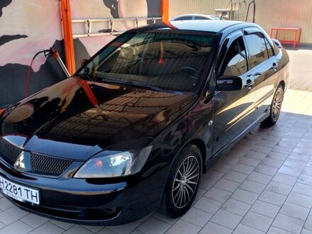 Міцубісі Lancer 2005 у Одесі на Automoto.ua Чорний Міцубісі Lancer, об'ємом двигуна 2 л та пробігом 253 тис. км за 5500 $, фото 1 на Automoto.ua