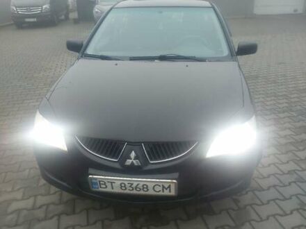 Чорний Міцубісі Lancer, об'ємом двигуна 1.58 л та пробігом 275 тис. км за 3100 $, фото 1 на Automoto.ua