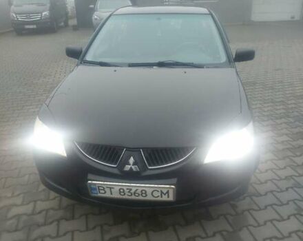 Чорний Міцубісі Lancer, об'ємом двигуна 1.58 л та пробігом 275 тис. км за 3100 $, фото 1 на Automoto.ua