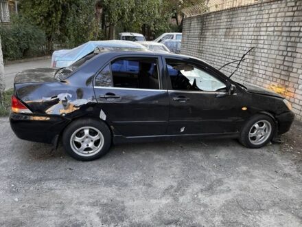 Мицубиси Лансер 2005 в Киеве на Automoto.ua Черный Мицубиси Лансер, объемом двигателя 1.6 л и пробегом 172 тыс. км за 2000 $, фото 1 на Automoto.ua