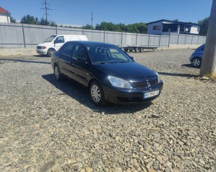 Черный Мицубиси Лансер, объемом двигателя 1.6 л и пробегом 211 тыс. км за 2850 $, фото 1 на Automoto.ua