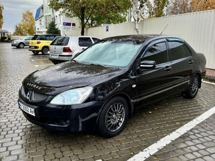 Міцубісі Lancer 2005 у Кременчуге на Automoto.ua Чорний Міцубісі Lancer, об'ємом двигуна 1.58 л та пробігом 236 тис. км за 4300 $, фото 1 на Automoto.ua