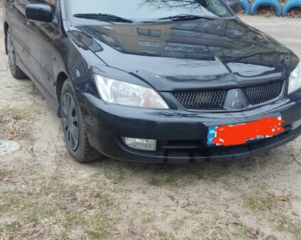 Чорний Міцубісі Lancer, об'ємом двигуна 1.6 л та пробігом 250 тис. км за 5500 $, фото 1 на Automoto.ua