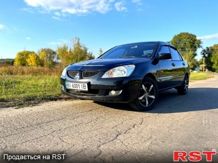 Чорний Міцубісі Lancer, об'ємом двигуна 1.6 л та пробігом 1 тис. км за 4000 $, фото 1 на Automoto.ua