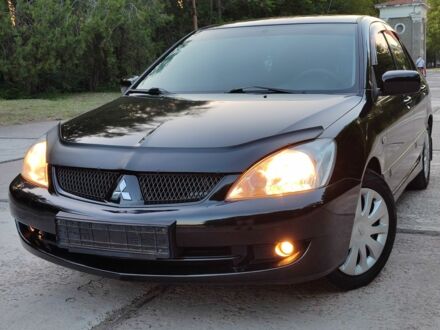 Міцубісі Lancer 2005 у Дніпро (Дніпропетровську) на Automoto.ua Чорний Міцубісі Lancer, об'ємом двигуна 1.6 л та пробігом 173 тис. км за 4800 $, фото 1 на Automoto.ua