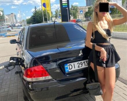 Черный Мицубиси Лансер, объемом двигателя 1.6 л и пробегом 250 тыс. км за 3100 $, фото 1 на Automoto.ua