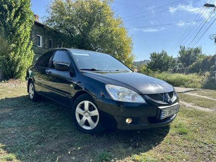 Чорний Міцубісі Lancer, об'ємом двигуна 1.6 л та пробігом 265 тис. км за 4200 $, фото 1 на Automoto.ua