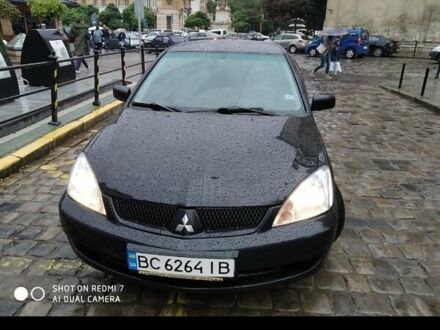 Чорний Міцубісі Lancer, об'ємом двигуна 1.6 л та пробігом 380 тис. км за 4600 $, фото 1 на Automoto.ua