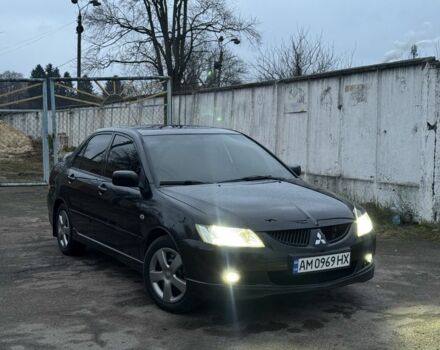 Чорний Міцубісі Lancer, об'ємом двигуна 1.6 л та пробігом 154 тис. км за 5500 $, фото 1 на Automoto.ua
