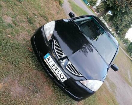 Чорний Міцубісі Lancer, об'ємом двигуна 1.58 л та пробігом 210 тис. км за 2999 $, фото 1 на Automoto.ua