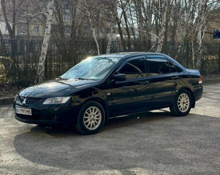Чорний Міцубісі Lancer, об'ємом двигуна 1.6 л та пробігом 270 тис. км за 3900 $, фото 1 на Automoto.ua