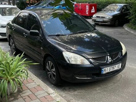 Чорний Міцубісі Lancer, об'ємом двигуна 1.6 л та пробігом 198 тис. км за 3200 $, фото 1 на Automoto.ua