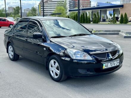 Чорний Міцубісі Lancer, об'ємом двигуна 1.6 л та пробігом 162 тис. км за 4999 $, фото 1 на Automoto.ua