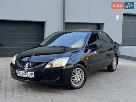 Чорний Міцубісі Lancer, об'ємом двигуна 1.6 л та пробігом 210 тис. км за 2950 $, фото 1 на Automoto.ua