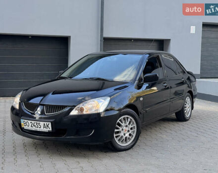 Чорний Міцубісі Lancer, об'ємом двигуна 1.6 л та пробігом 210 тис. км за 2950 $, фото 1 на Automoto.ua