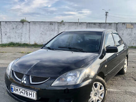 Чорний Міцубісі Lancer, об'ємом двигуна 1.58 л та пробігом 300 тис. км за 3650 $, фото 1 на Automoto.ua