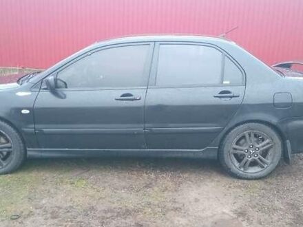Чорний Міцубісі Lancer, об'ємом двигуна 2 л та пробігом 270 тис. км за 3200 $, фото 1 на Automoto.ua