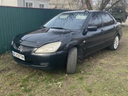 Міцубісі Lancer 2005 у Магалиновке на Automoto.ua Чорний Міцубісі Lancer, об'ємом двигуна 1.58 л та пробігом 279 тис. км за 4000 $, фото 1 на Automoto.ua