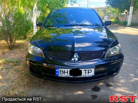 Міцубісі Lancer 2006 у Белгород-Днестровском на Automoto.ua Чорний Міцубісі Lancer, об'ємом двигуна 2 л та пробігом 173 тис. км за 5200 $, фото 1 на Automoto.ua