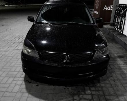 Чорний Міцубісі Lancer, об'ємом двигуна 2 л та пробігом 300 тис. км за 4100 $, фото 1 на Automoto.ua