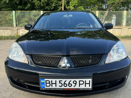 Міцубісі Lancer 2006 у Болграде на Automoto.ua Чорний Міцубісі Lancer, об'ємом двигуна 1.58 л та пробігом 195 тис. км за 4500 $, фото 1 на Automoto.ua