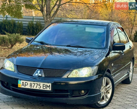 Міцубісі Lancer 2006 у Дніпро (Дніпропетровську) на Automoto.ua Чорний Міцубісі Lancer, об'ємом двигуна 2 л та пробігом 230 тис. км за 4900 $, фото 1 на Automoto.ua