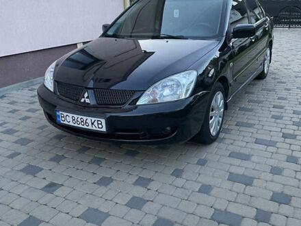 Міцубісі Lancer 2006 у Сокале на Automoto.ua Чорний Міцубісі Lancer, об'ємом двигуна 1.58 л та пробігом 175 тис. км за 4900 $, фото 1 на Automoto.ua